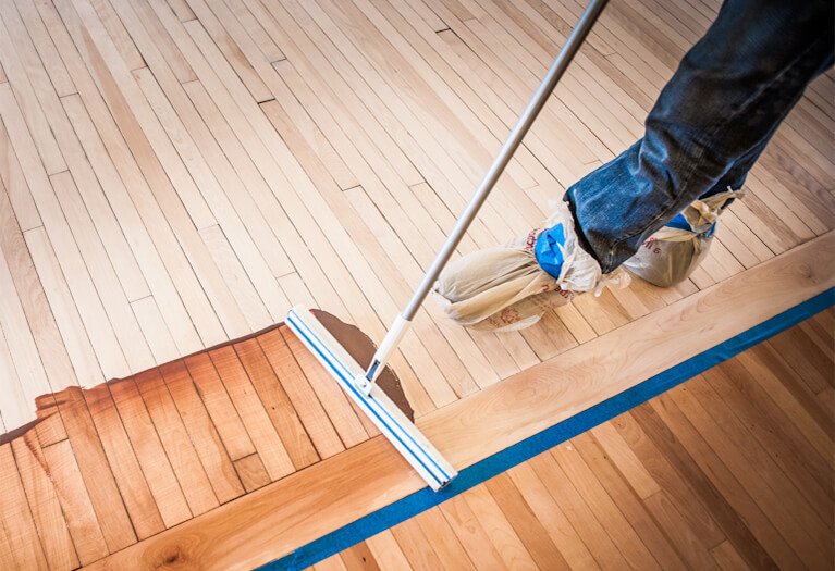 How do you remove dried water stains from wood?